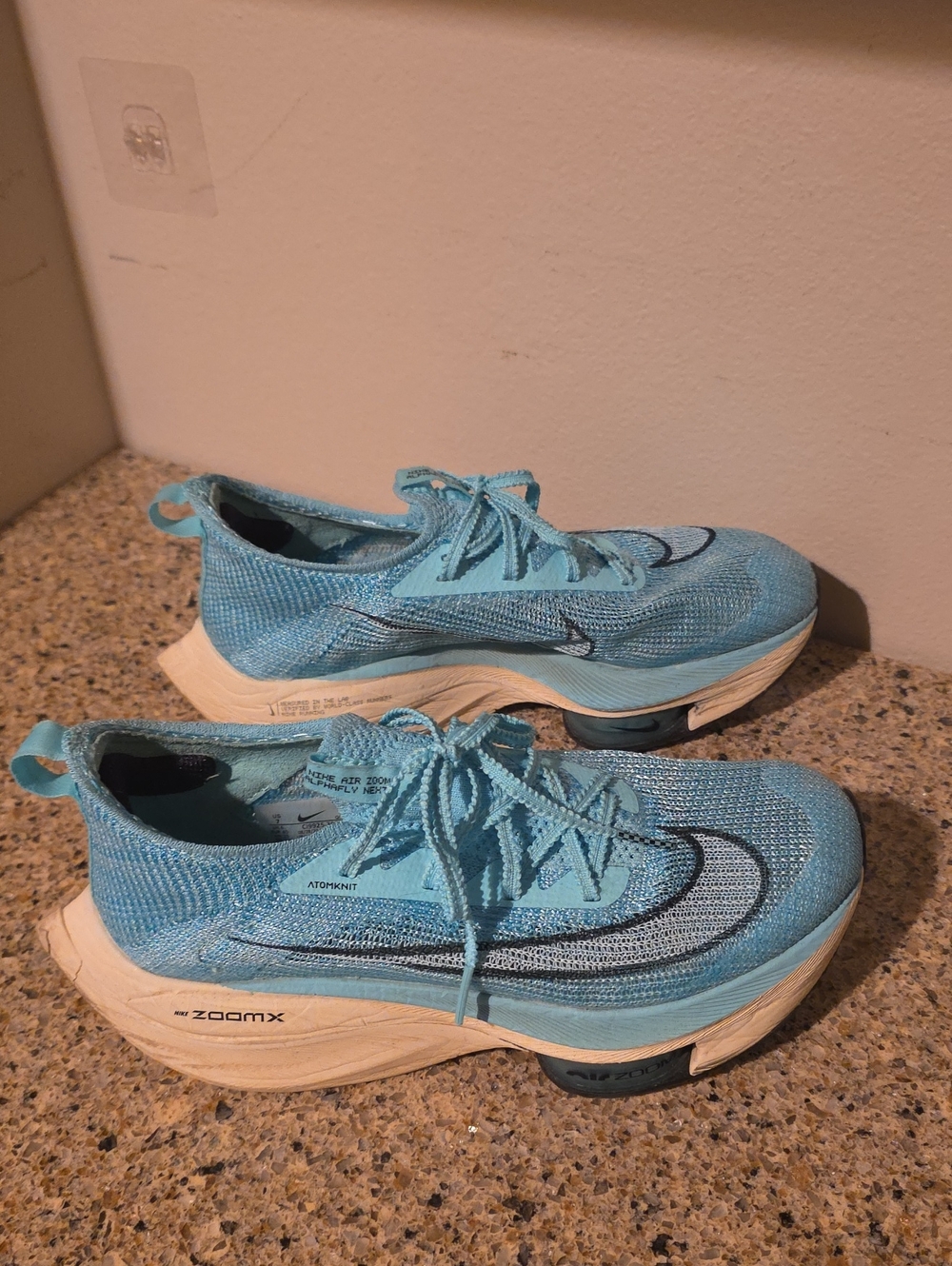 Nike Light Blue Flyknit Lace-Up Running Shoes